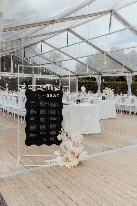 Wiggle Black Seating Chart sign with white text at Vaucluse Estate, Conara